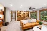 This inviting living space features a cozy bunk bed area, perfect for guests or family.
