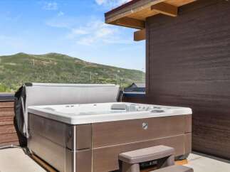 Enjoy ultimate relaxation in this luxurious hot tub, perfect for unwinding after a long day.