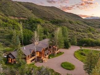 Nestled amidst rolling hills and lush greenery, this stunning mountain estate offers unparalleled privacy and breathtaking views.