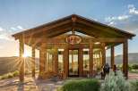 Experience the ultimate mountain retreat in this stunning cabin, featuring expansive glass walls that bring the breathtaking landscape indoors.