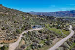 Discover this stunning mountain retreat, perfectly situated on a sprawling hillside with breathtaking panoramic views.