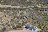 Discover this stunning multi-level home nestled on a sprawling hillside, offering breathtaking panoramic views.