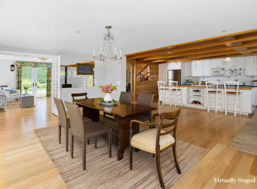 Experience the perfect blend of rustic charm and modern convenience in this spacious open-concept living area.