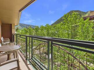 Enjoy breathtaking mountain views from this charming balcony, perfect for morning coffee or evening relaxation.