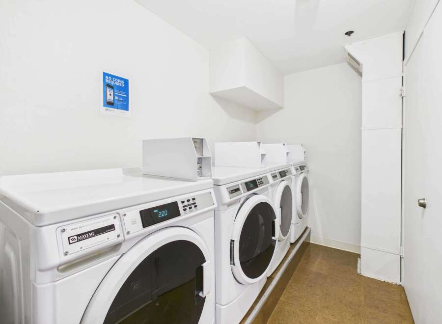 Discover the convenience of this on-site laundry facility, featuring multiple Maytag high-efficiency washers.