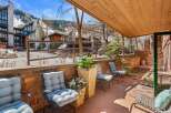 Enjoy the mountain views from this charming patio, perfect for relaxing after a day on the slopes.