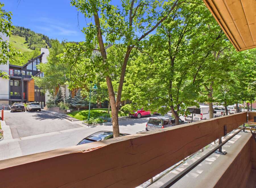 Enjoy stunning mountain views from this property, nestled amidst lush greenery and mature trees.