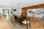 Experience the perfect blend of rustic charm and modern convenience in this spacious open-concept living area.