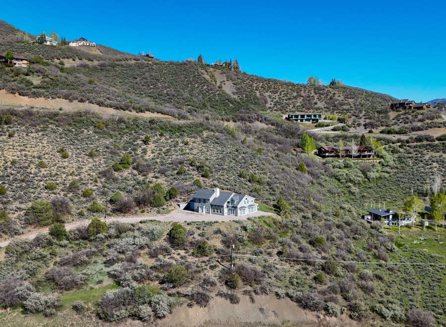 Discover luxury living nestled on a scenic hillside, offering breathtaking views and serene surroundings.