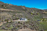 Discover luxury living nestled on a scenic hillside, offering breathtaking views and serene surroundings.