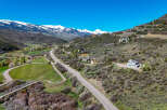 Experience luxury mountain living with this stunning property offering breathtaking panoramic views of snow-capped peaks and lush valleys.