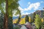 Experience the beauty of autumn in this stunning mountain home, nestled amongst vibrant fall foliage.