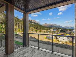 Experience breathtaking mountain views from this stunning balcony, perfect for enjoying your morning coffee or evening relaxation.