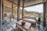 Enjoy breathtaking mountain views from this stunning covered patio, perfect for year-round relaxation.