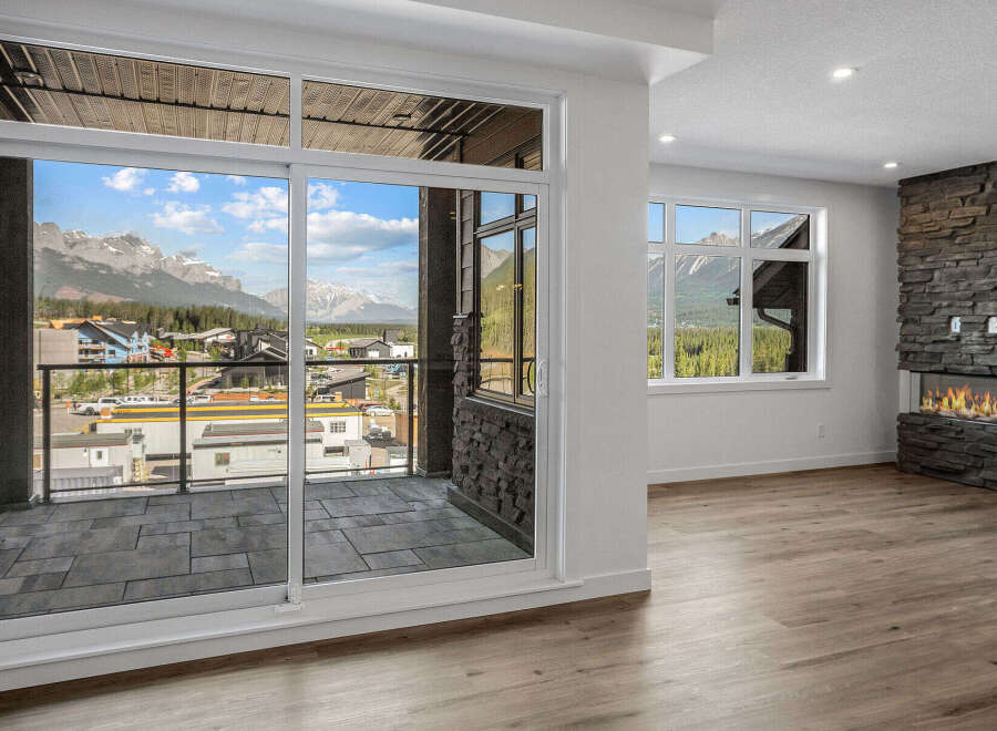 Experience breathtaking mountain views from this stunning property, featuring a spacious balcony perfect for enjoying the scenery.