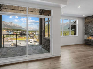 Experience breathtaking mountain views from this stunning property, featuring a spacious balcony perfect for enjoying the scenery.