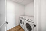 Discover the convenience of this dedicated laundry space, featuring a stacked Samsung washer and dryer set.