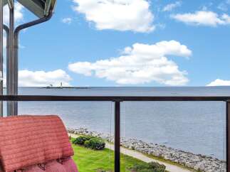 Enjoy breathtaking ocean views from this stunning property, complete with a private balcony overlooking the water.