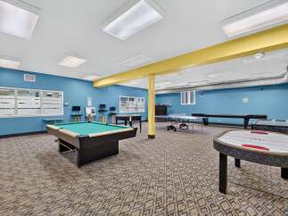 Step into this vibrant game room, perfect for entertainment and relaxation.