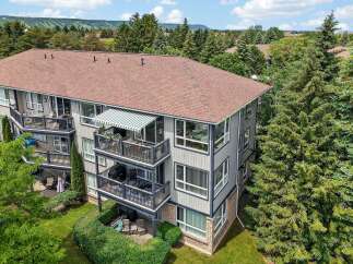 Experience comfortable living in this multi-story condo featuring multiple balconies with scenic views.