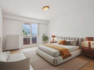 Experience serene living in this beautifully appointed bedroom, featuring a plush bed and elegant bedside tables.