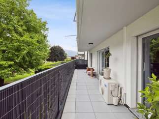 Enjoy the fresh air and scenic views from this spacious balcony, perfect for relaxing or entertaining.