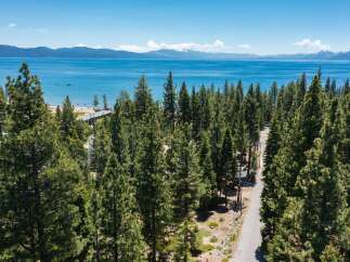 Experience the ultimate lakeside lifestyle with this stunning property offering direct access to the crystal-clear waters of Lake Tahoe.
