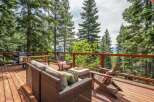 Enjoy breathtaking lake views from this stunning deck, perfect for outdoor entertaining.