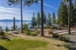 Enjoy lakeside living with this stunning property featuring direct water access and breathtaking mountain views.