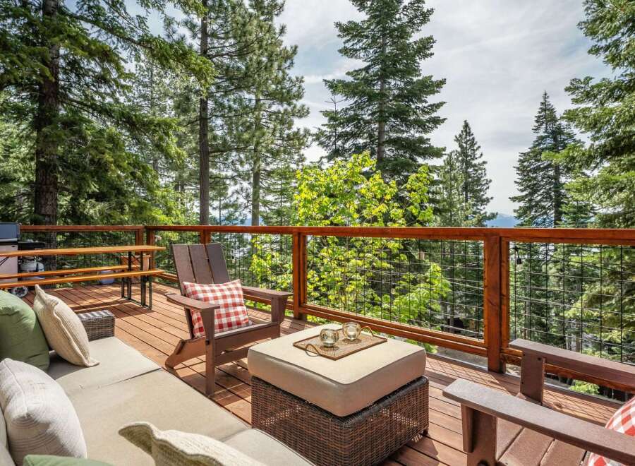 Enjoy breathtaking mountain views from this spacious deck, perfect for outdoor entertaining.