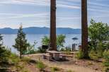 Enjoy breathtaking lake views from this serene lakeside property, perfect for outdoor entertaining.