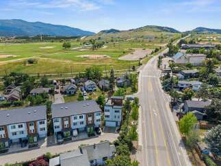 Discover modern living in this vibrant community, featuring stylish townhomes with contemporary architecture and private garages.