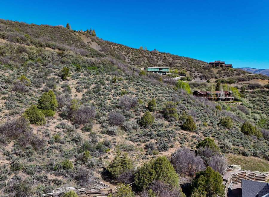 Nestled on a scenic hillside, this property offers breathtaking views and a sense of secluded luxury.