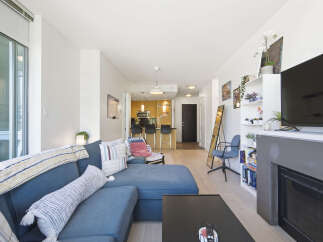 Experience modern living in this stylish condo featuring an open-concept layout perfect for entertaining.