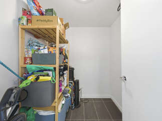 Maximize your storage with this practical shelving unit, perfect for organizing pantry items, cleaning supplies, or household essentials.