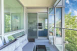 Enjoy outdoor living on this spacious balcony, perfect for relaxing or entertaining.