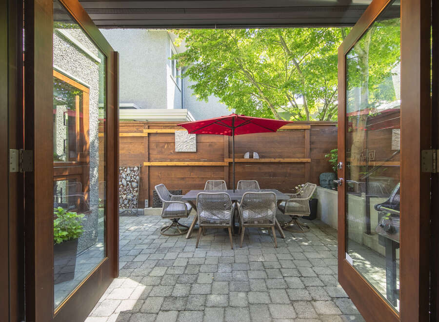 Step outside to a private patio oasis, perfect for al fresco dining and entertaining.