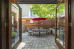 Step outside to a private patio oasis, perfect for al fresco dining and entertaining.