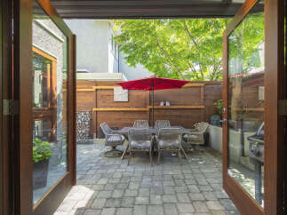 Step outside to a private patio oasis, perfect for al fresco dining and entertaining.