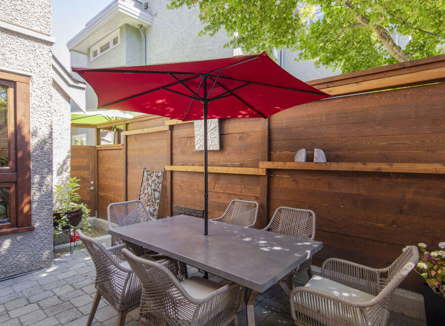Enjoy outdoor living in this charming patio space, perfect for al fresco dining and entertaining.