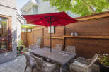 Enjoy outdoor living in this charming patio space, perfect for al fresco dining and entertaining.