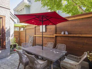 Enjoy outdoor living in this charming patio space, perfect for al fresco dining and entertaining.
