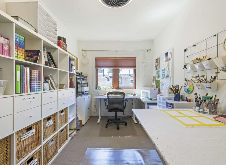 Discover an artist's dream studio, meticulously organized for creativity and productivity.