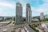 Experience modern urban living in these stunning high-rise apartments, featuring sleek architecture and expansive balconies offering breathtaking city and mountain views.
