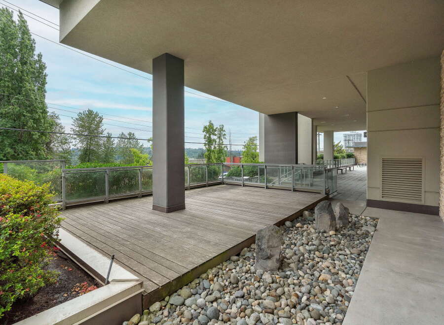 Enjoy the outdoors on this spacious deck, perfect for entertaining or relaxing with a view.