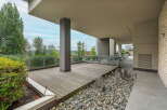 Enjoy the outdoors on this spacious deck, perfect for entertaining or relaxing with a view.
