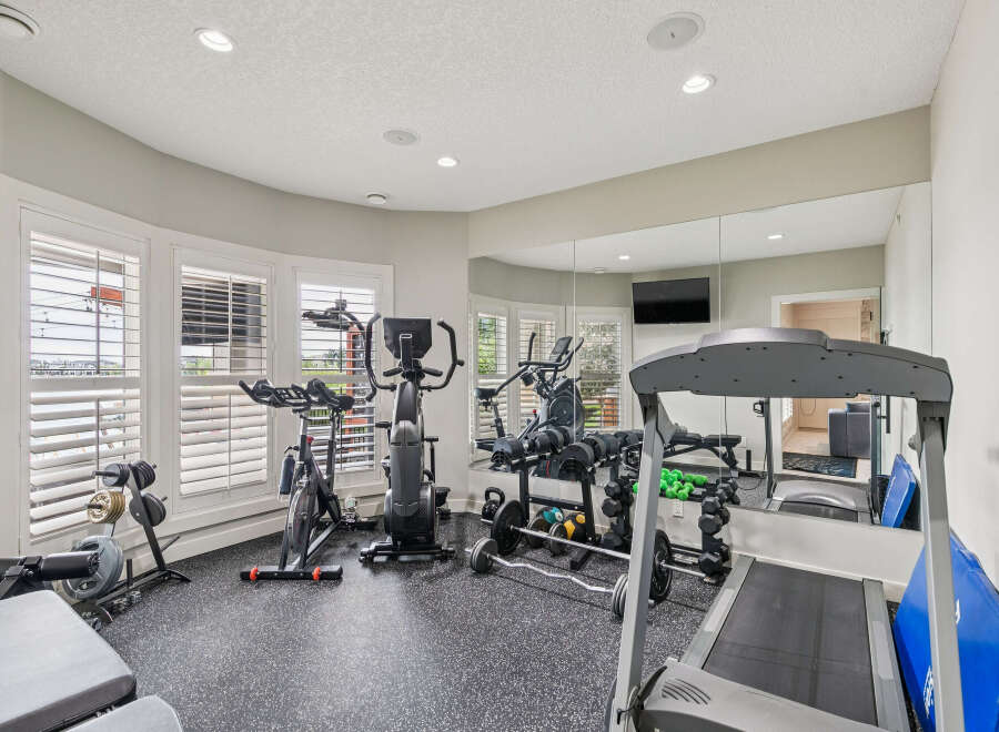Transform your home into a personal fitness sanctuary with this fully equipped gym.