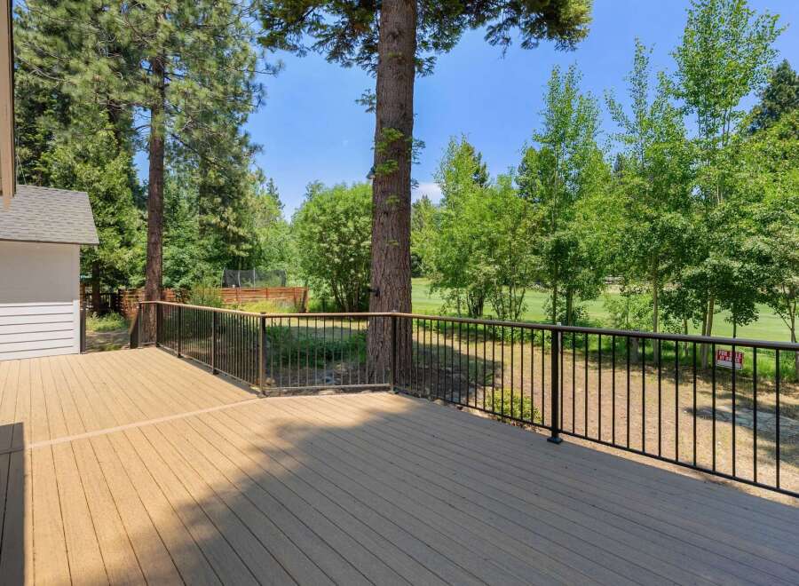 Enjoy the outdoors from this expansive deck, perfect for entertaining or relaxing with a view.