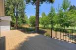 Enjoy the outdoors from this expansive deck, perfect for entertaining or relaxing with a view.
