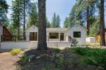 Experience modern living nestled amongst tall pines with this beautifully renovated home.